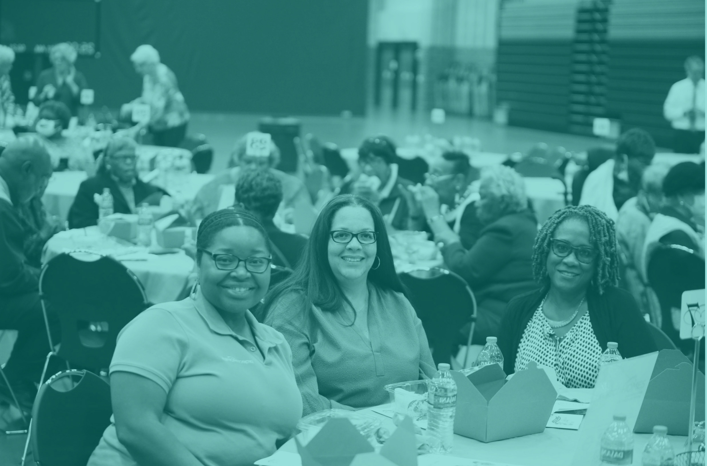 Group sitting at table at luncheon
